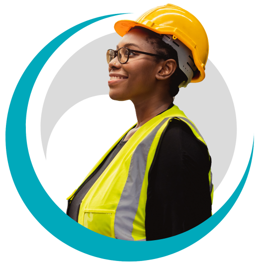 Woman in hard hat and yellow vest with SVF logo behind her