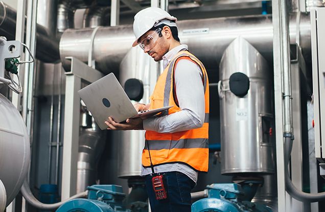Engineer checking status of valves